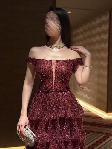 فستان سهرة لؤلؤ كلاسيكي يوحى بالفخامه