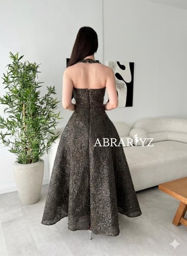 فستان سهرة طويل مطرز بالخرز كلوش