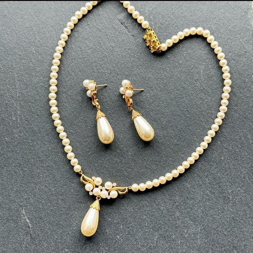 طقم فنتج من اللؤلؤ ماركة Lotus من التسعينات الميلا...