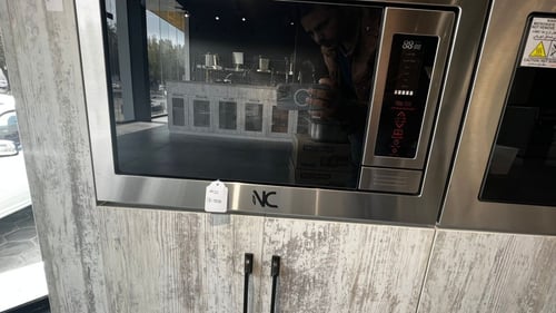 ميكروويف بشواية من ان سي بسعة 25 لتر وجهد 1200 واط...