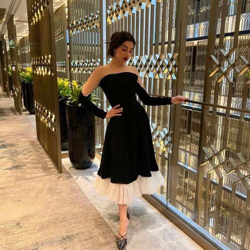 Black crepe dress with tulle and crystal