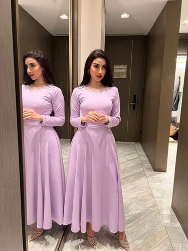Purple crepe dress decorated with pearls and crystals