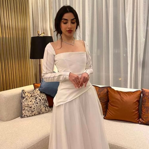 White top and skirt decorated with sequined threads