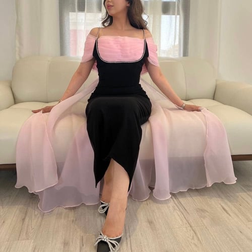 Black crepe dress decorated with crystal threads