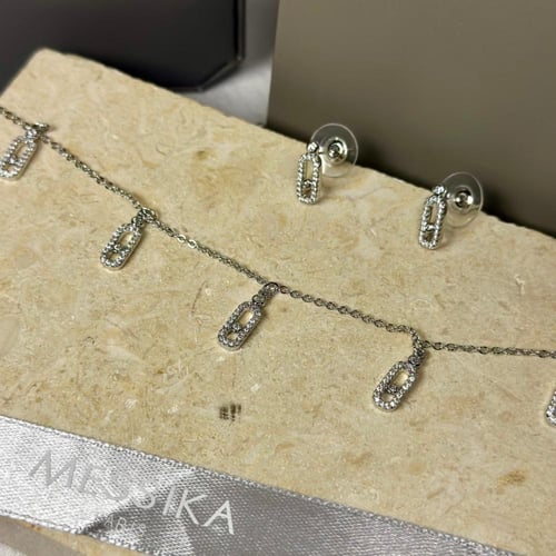 شوكر وحلق M فضي