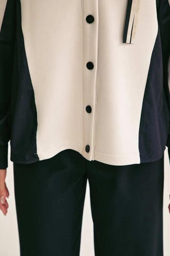 جاكيت بأزرار إغلاق