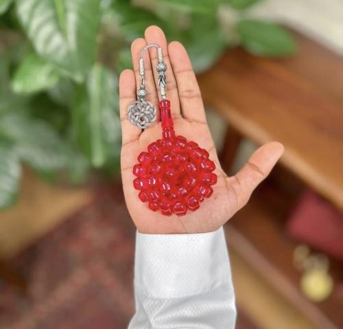 A prayer bead with a clasp