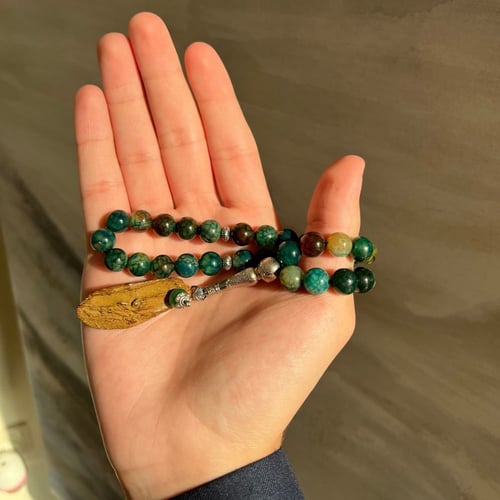 سبحة مع كسره عود