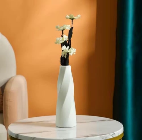 مزهرية أنيقة مثالية لعرض الزهور وإضفاء لمسة من الر...