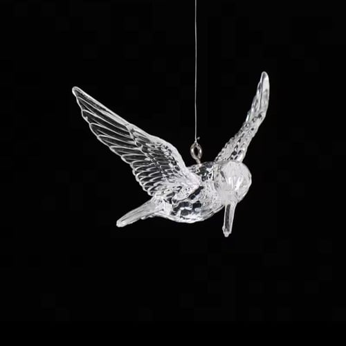 مجموعة من أربع قطع زينة معلقه على شكل طائر الطنان...