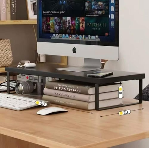 طاولة شاشة مكتبي أنيق وعملي. يتميز بسطح خشبي أنيق...