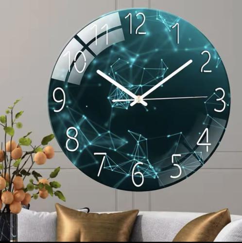 ساعة الحائطية العصرية بتصميم دائري أنيق مع خلفية د...