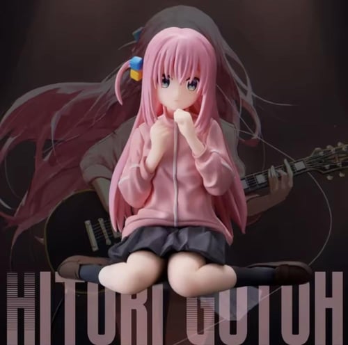 مجسم لشخصية ذات شعر وردي طويل، يتميز بألوانه الزاه...