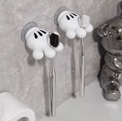 حامل فرشاة أسنان عملي ومرح، مصمم على شكل يد كرتوني...