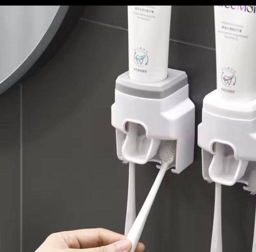 موزع فرش أسنان أوتوماتيكي. يُثبّت على الحائط، ويتي...