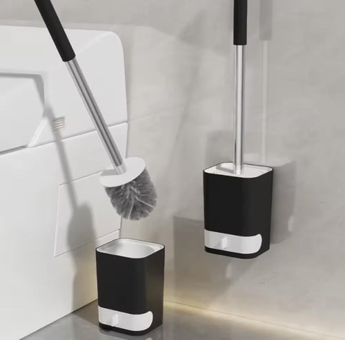 مجموعة فرشاة تنظيف المرحاض وحاملها بتصميم عصري. تت...