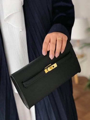 M. شنطة Hermès