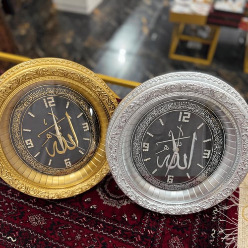 ساعة بشكل بيضاوي - ابيض