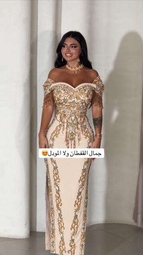 فستان سهرة فاخر مرصع بالألماس والخرز