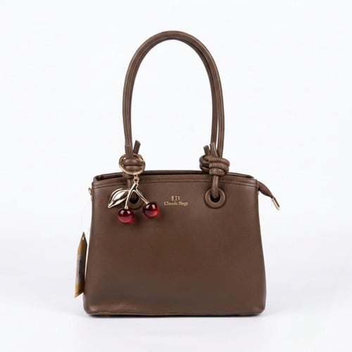 شنطة يد نسائية أنيقة بتعليقة كرز وألوان عصرية