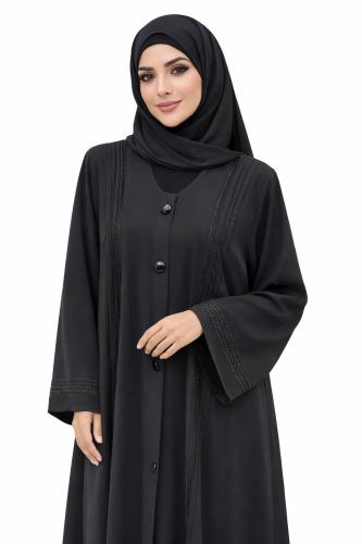 عباية سوداء بأزرار أمامية ولمسات ناعمة بتصميم أنيق...