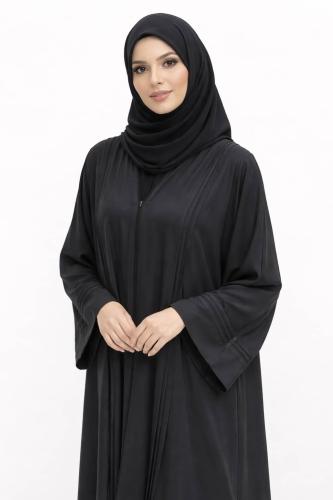 عباية سوداء انسيابية بتفاصيل ناعمة وتصميم راقٍ عصر...