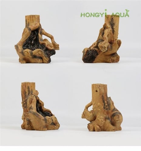 ديكور دوفين شلال عبر جذع شجرة