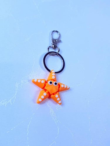 ميدالية مفاتيح نجمة البحر ثلاثية الأبعاد