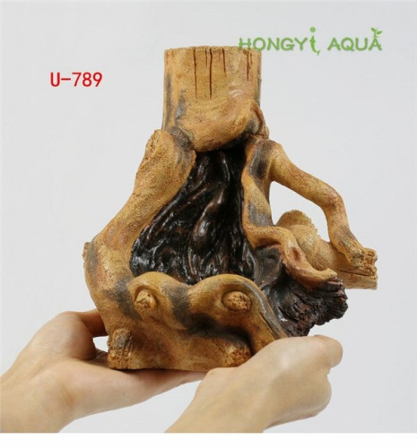 ديكور دوفين شلال عبر جذع شجرة