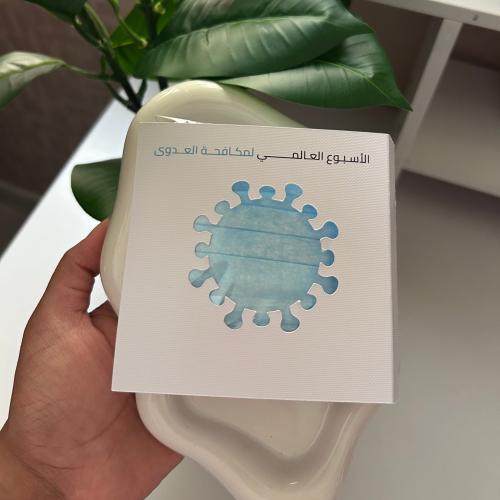 كمامة بتصميم كتيب توعوي