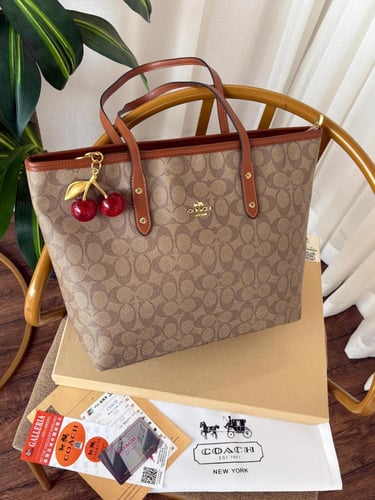 شنطة كوتش _ بني مع جملي