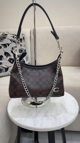 شنطة كوتش _ بني محروق فضي