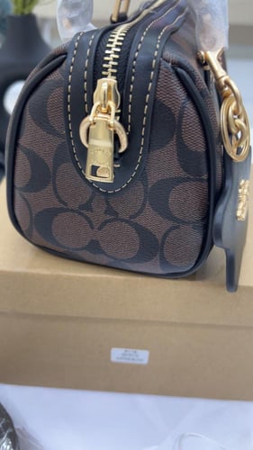 شنطة كوتش _ بني وعنابي