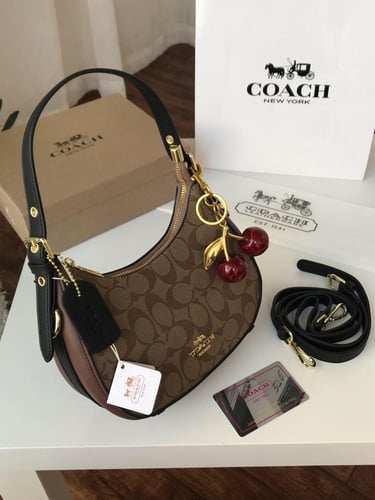 شنطة كوتش _ بني