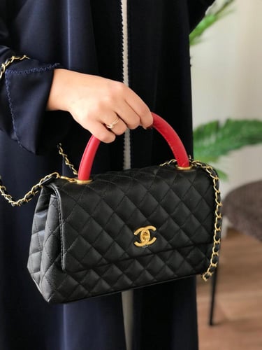 شنطه شانيل _ أسود ممسك أحمر( حجم وسط )