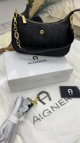 شنطة اقنر _ أسود لمعه