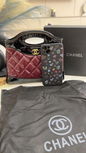 شنطة شانيل _ أسود وعنابي لمعه