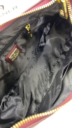 شنطة اقنر _ أسود لمعه