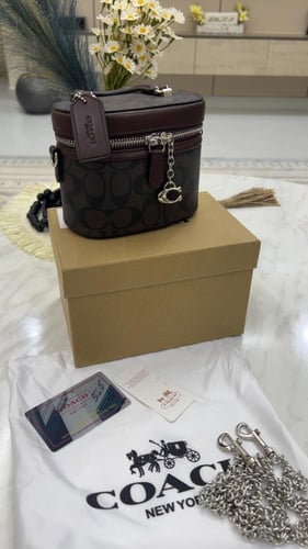 شنطة كوتش _ بني محروق فضي