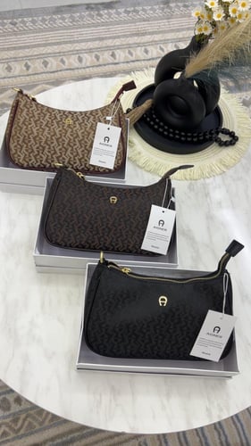 شنطة اقنر _ بني محروق قماش