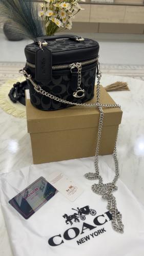 شنطة كوتش _ أسود قماش فضي