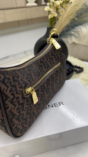 شنطة اقنر _ بني محروق قماش