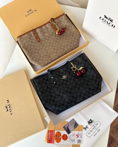 شنطة كوتش _ بني مع جملي