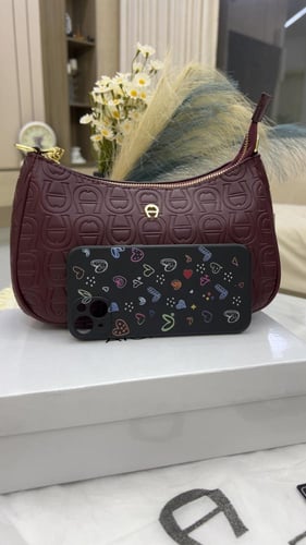 شنطة اقنر _ عنابي لمعه