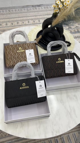 شنطة اقنر _ بني محروق قماش