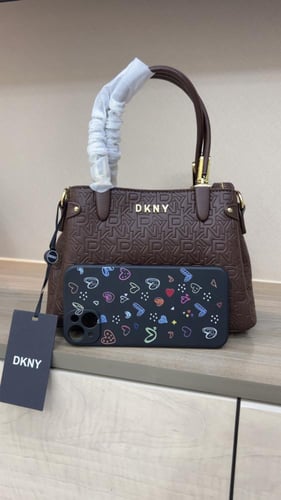 شنطة دكني _ بني لمعه