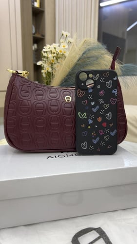 شنطة اقنر _ أسود لمعه