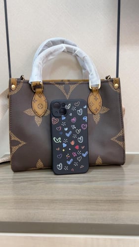 شنطة لويس فيتون _ بني وجهين