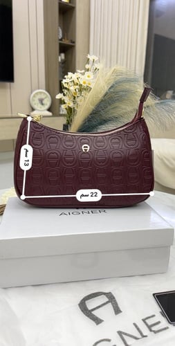 شنطة اقنر _ عنابي لمعه