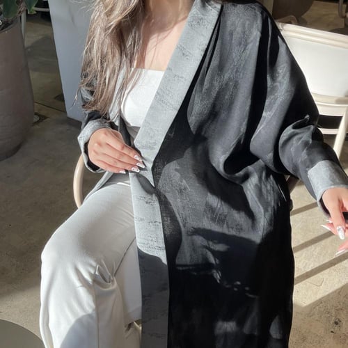 كلوش مموج مع ثنية من الامام والاكمام